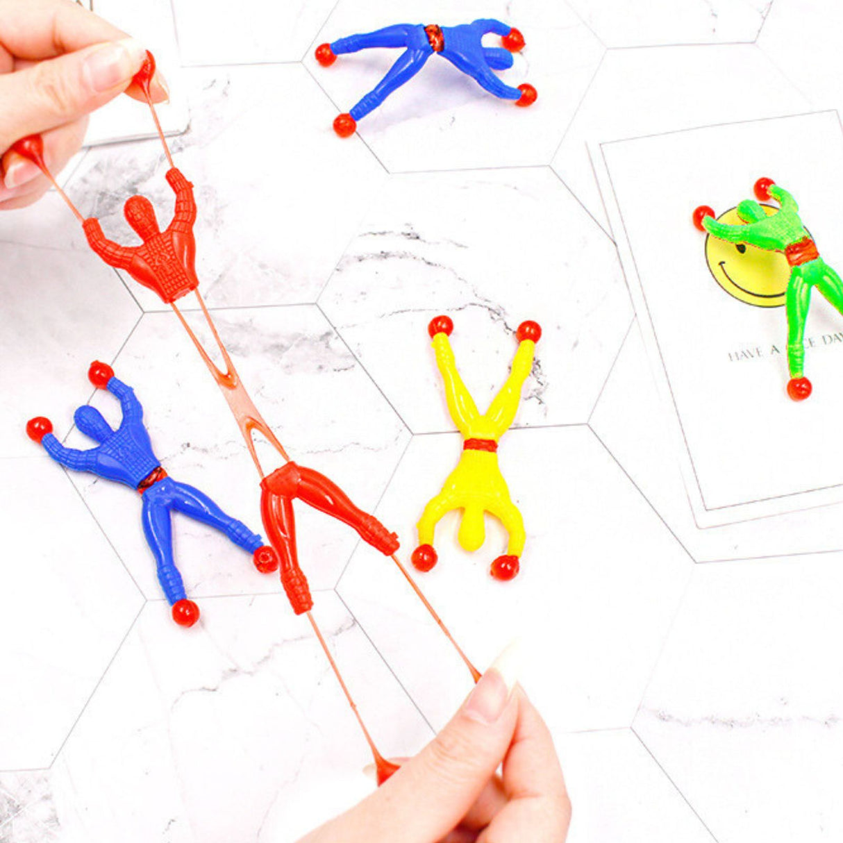 Klebe-Spielzeug Kletter-Männchen Wand-Kletterer Fensterläufer Sticky Toy